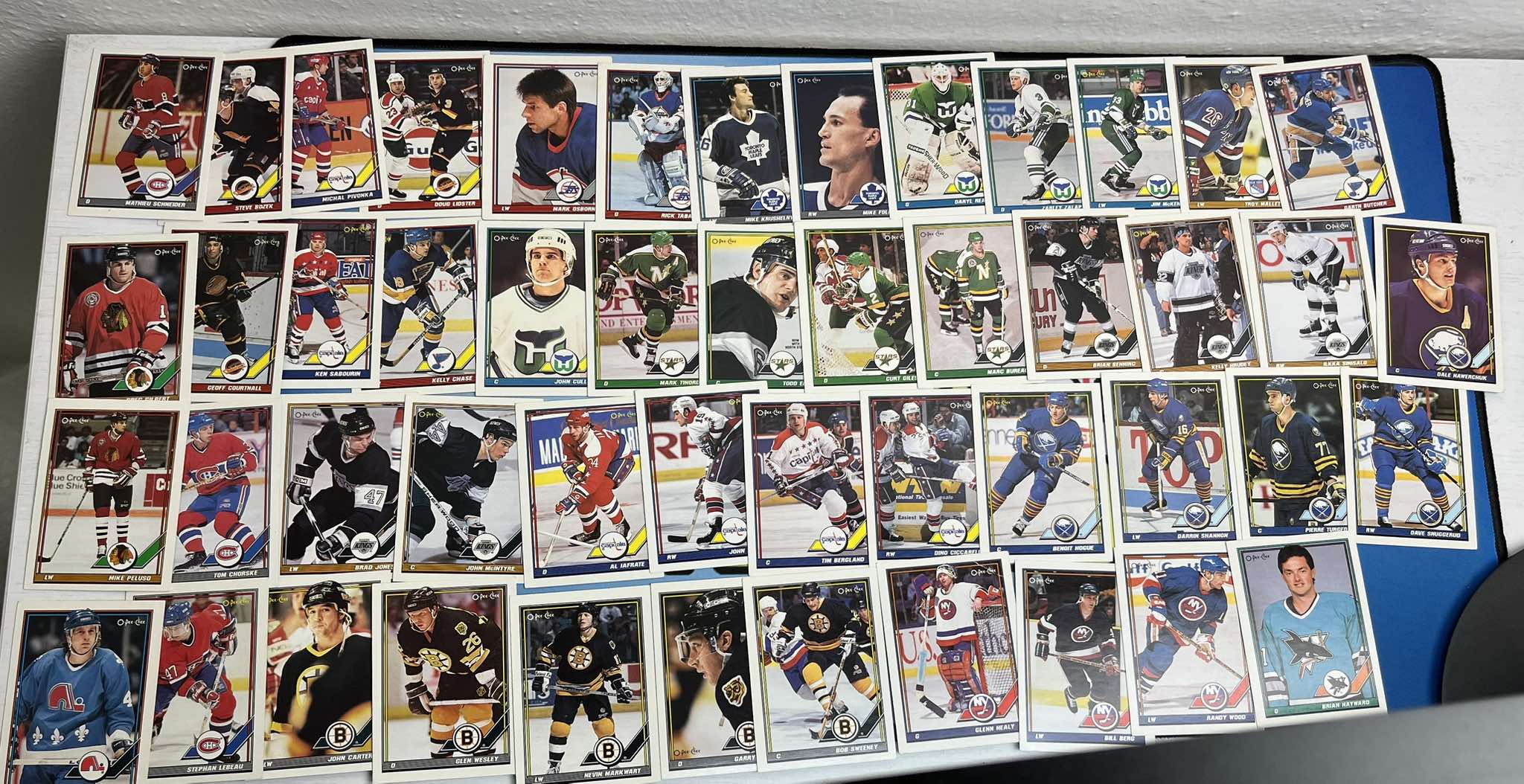 LOT lehce poškozených (viz popis) řadových karet 91-92 O-Pee-Chee - (49 kusů karet)